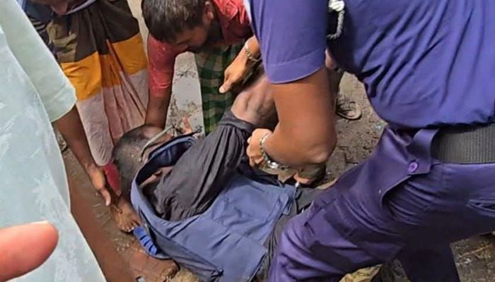 চাঁদা তুলতে বাধা, পুলিশ কর্মকর্তার ওপর হামলা 